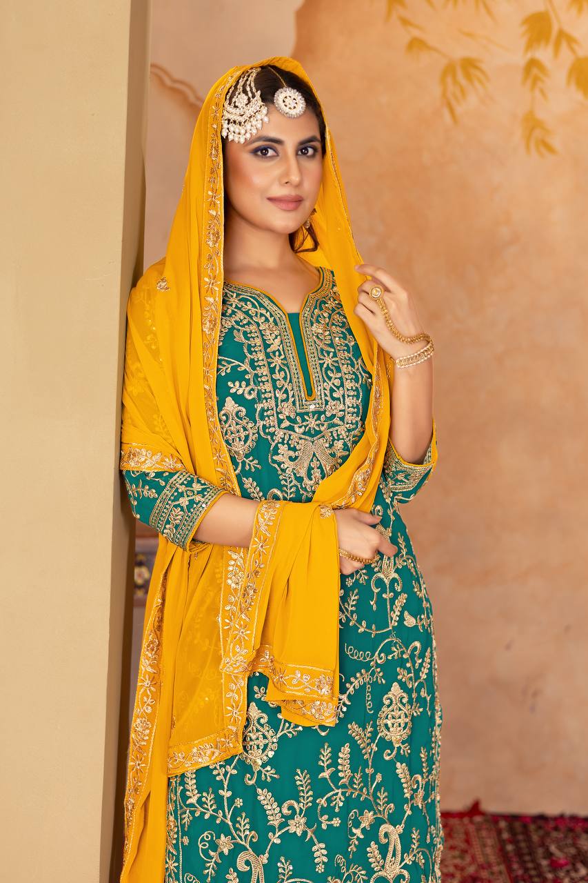 Punjabi Blossom New Designer Heavy Fuax Georgette Fancy Top With Plazzo Suit Set