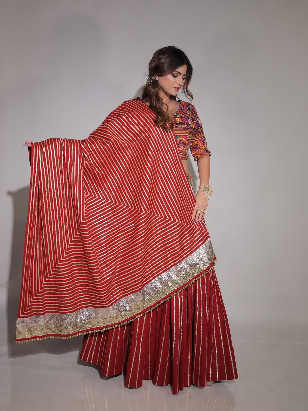 Rich Maroon Chaniya Choli with Golden Toi Work And Traditional Kachhi Blouse