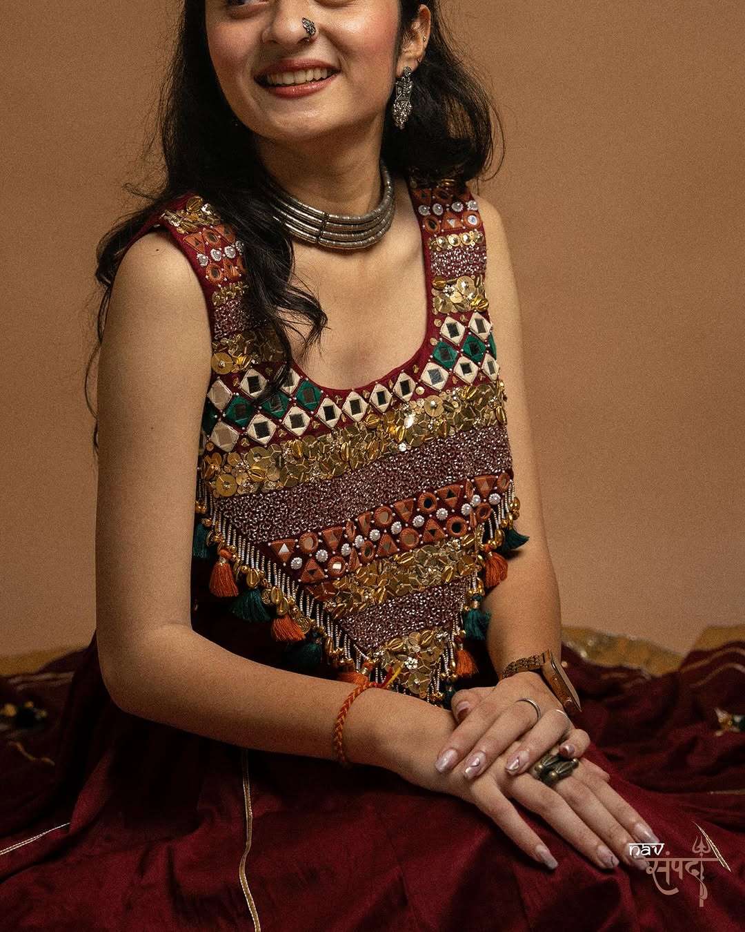 kutchi mirror work blouse and stunning maroon flared Lahenga