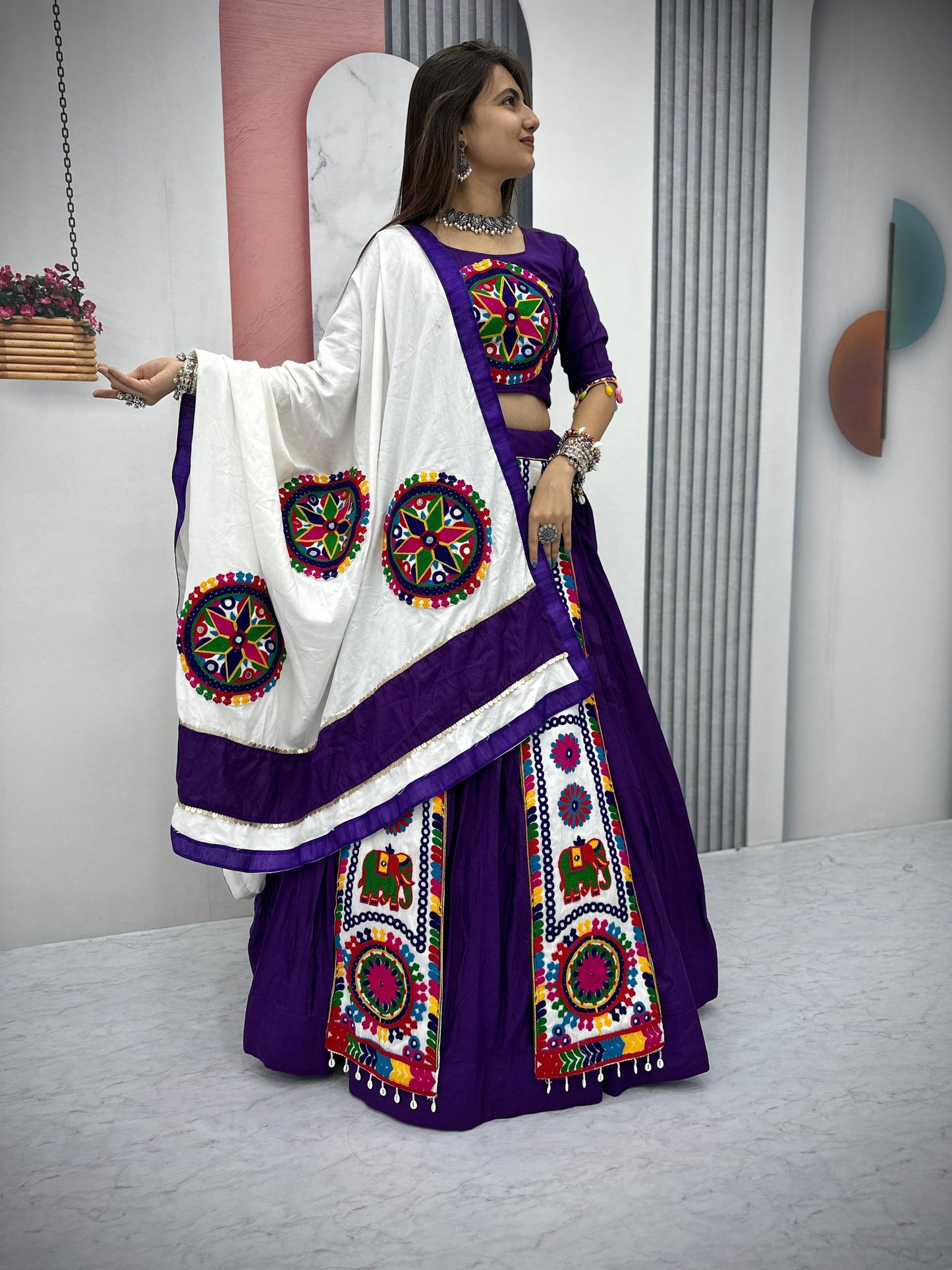 Vibrant Gujarati Embroidery Lehenga with White Dupatta