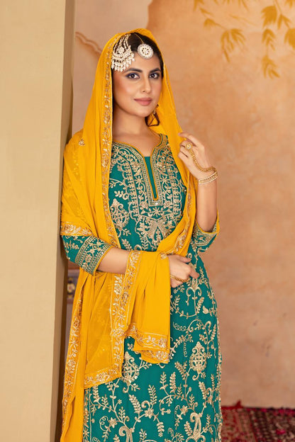Punjabi Blossom New Designer Heavy Fuax Georgette Fancy Top With Plazzo Suit Set