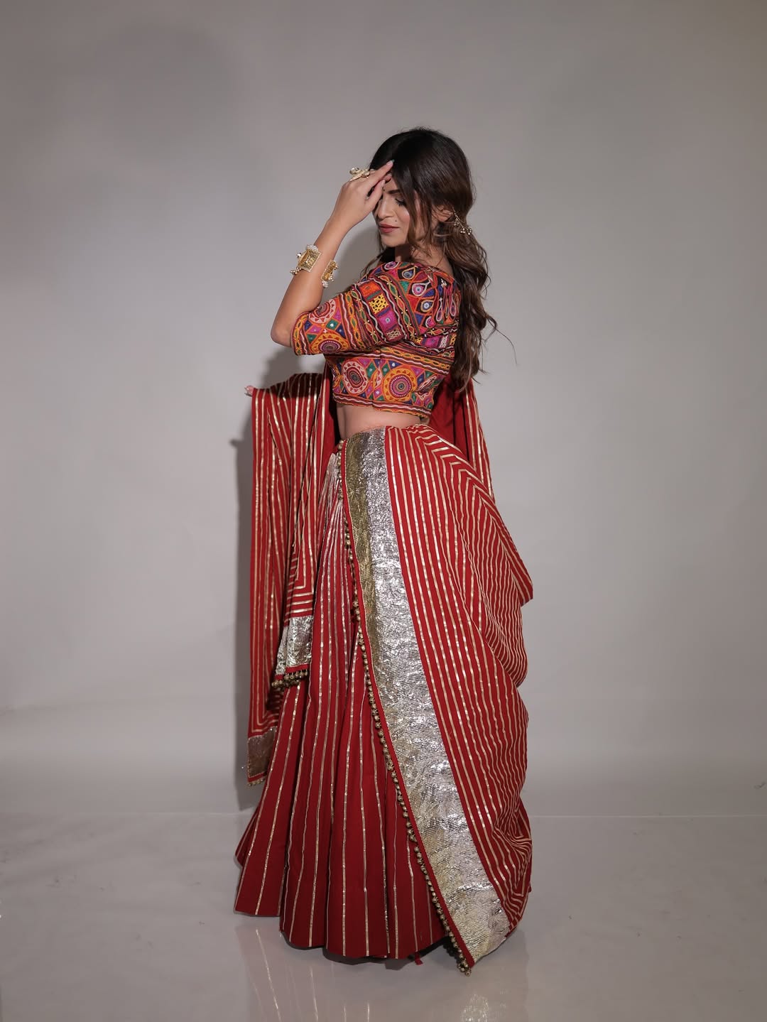 Rich Maroon Chaniya Choli with Golden Toi Work And Traditional Kachhi Blouse