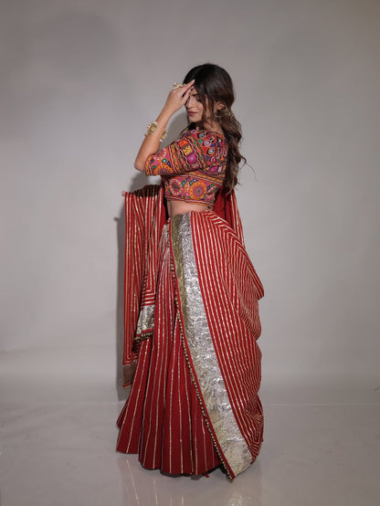 Rich Maroon Chaniya Choli with Golden Toi Work And Traditional Kachhi Blouse