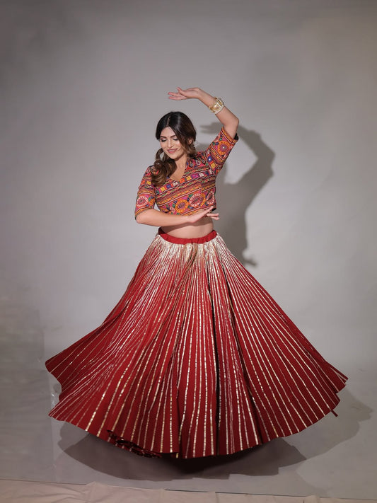 Rich Maroon Chaniya Choli with Golden Toi Work And Traditional Kachhi Blouse
