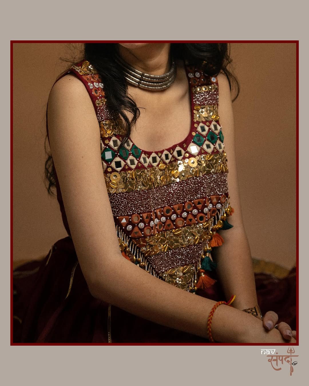 kutchi mirror work blouse and stunning maroon flared Lahenga