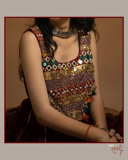kutchi mirror work blouse and stunning maroon flared Lahenga