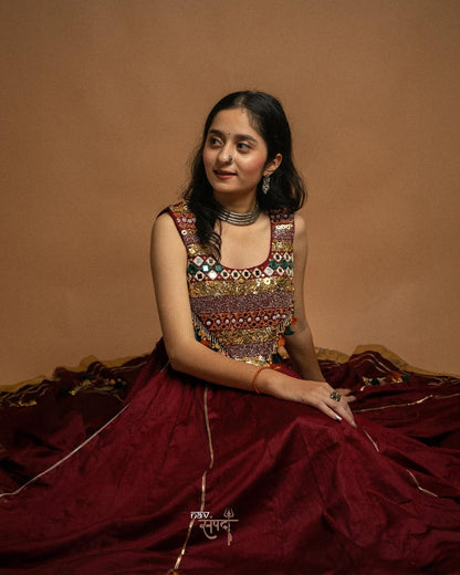 kutchi mirror work blouse and stunning maroon flared Lahenga
