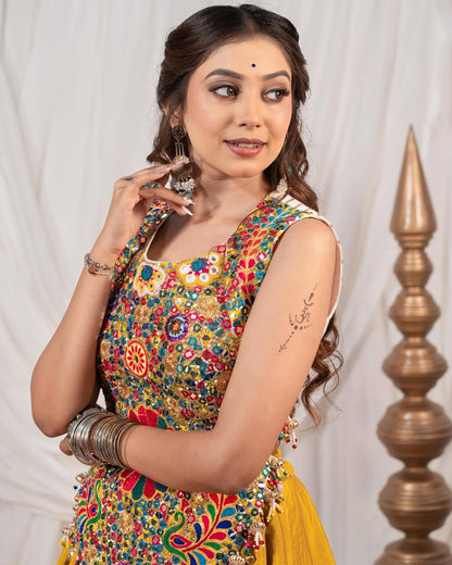 Yellow Chaniya With Grand 10-Meter Flair Paired With Detailed Kachhi Work Blouse.